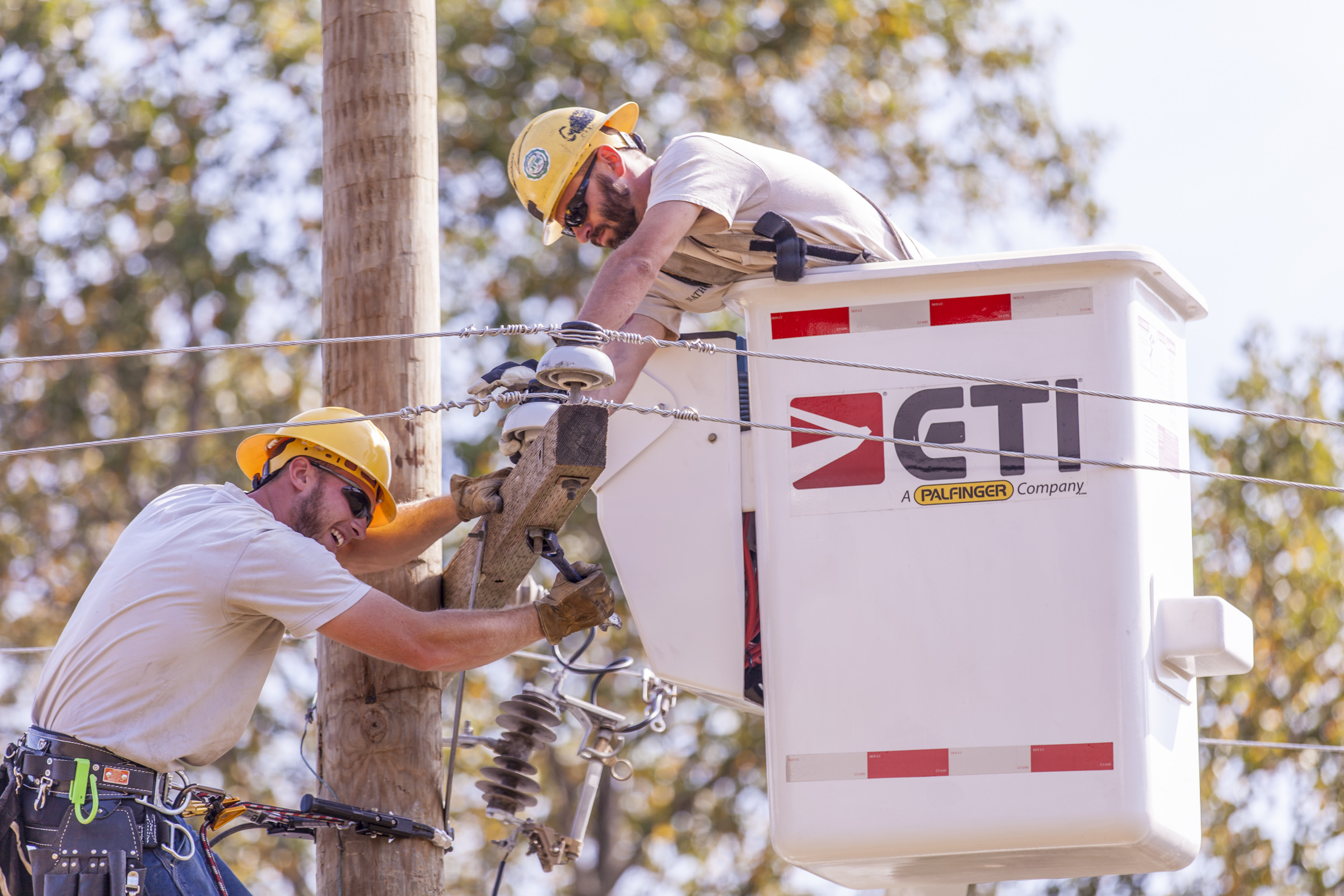 AUB Workers Fixing Power Pole